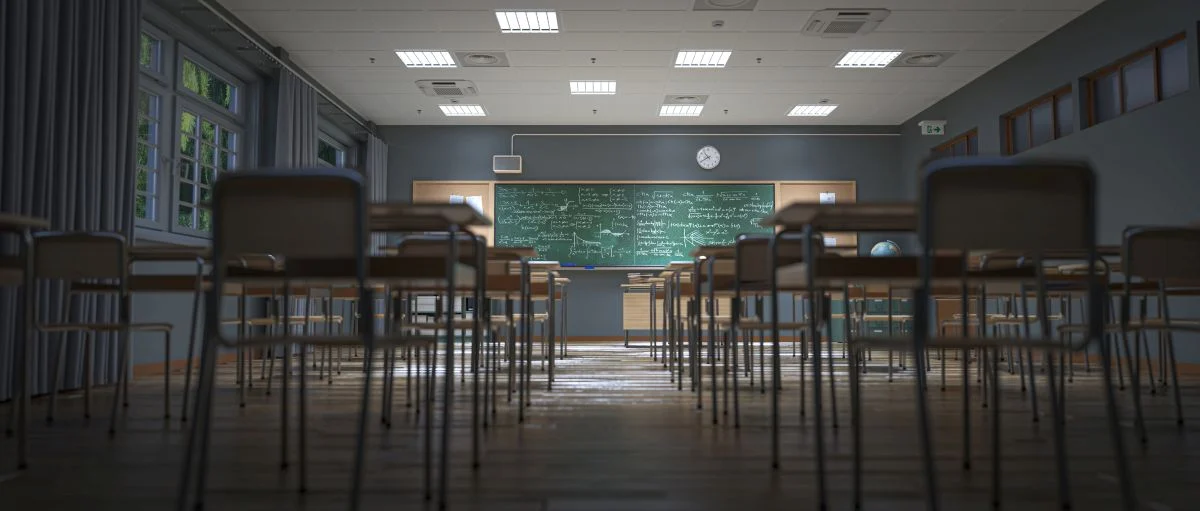 Image of a classroom with a chalkboard at the front